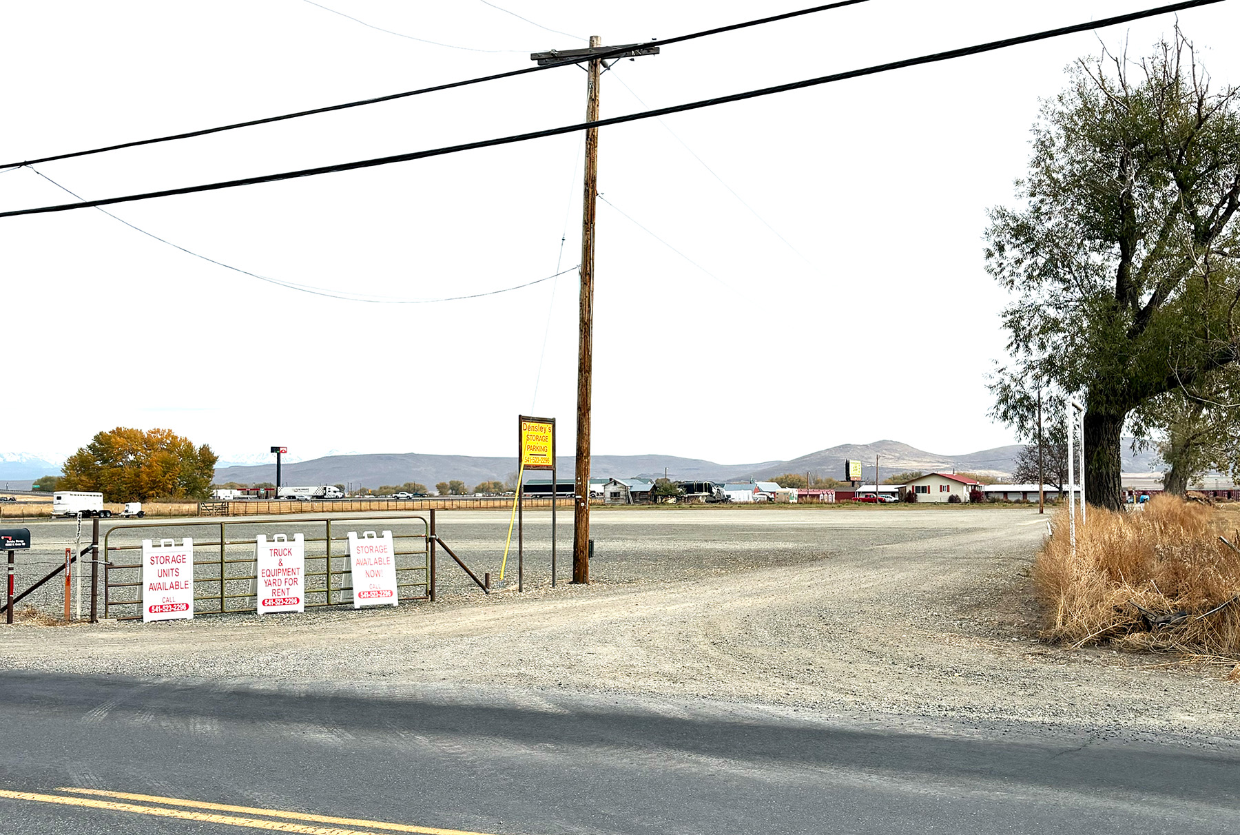 Entrance and access road to the commercial truck parking lot.